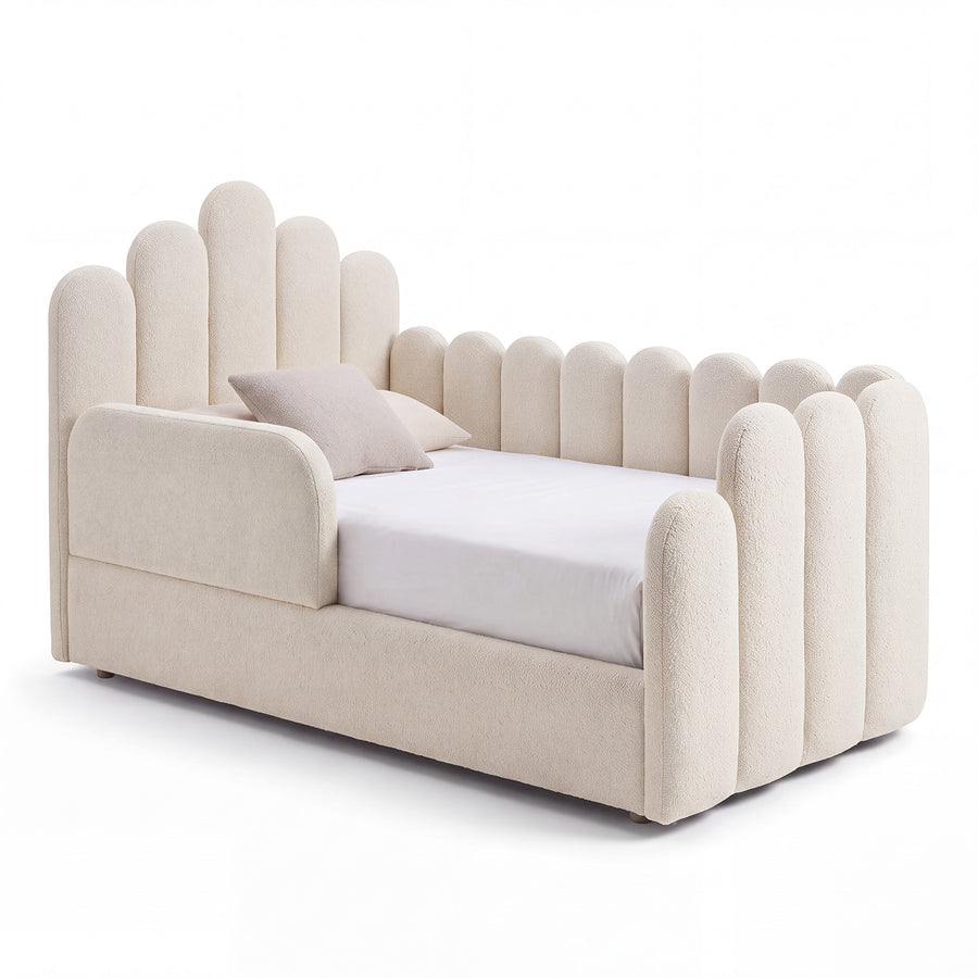 Eden upholstered toddler bed with soft curves and protective side panels