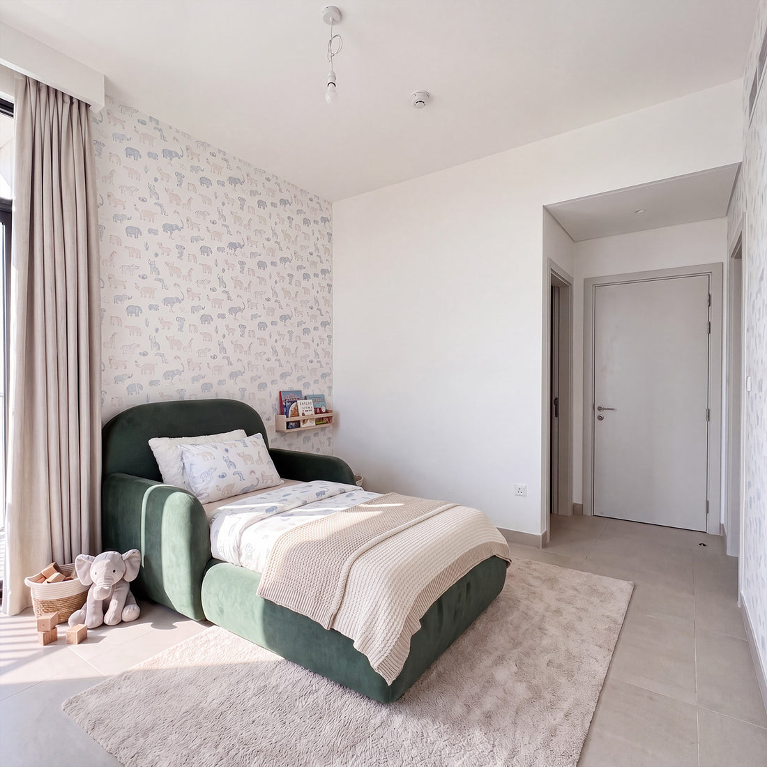 Honest Littles bedroom setting with soft upholstery, natural light and a calm colour palette